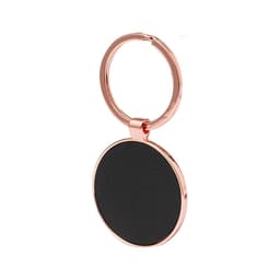 A rose gold keyring with a circular black tag. The keyring features a smooth finish and has a branding logo.