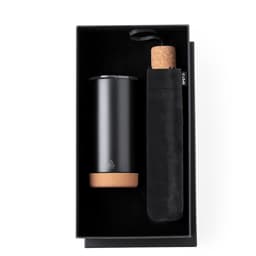 A drink bottle and a cork holder in a sleek black gift box, featuring a logo. The bottle has a black finish with a cork base.