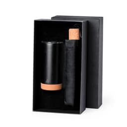 A drink bottle with a black exterior and cork base, presented in a sleek black gift box.