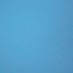 A light blue T-shirt with a smooth texture, featuring a logo on the front.