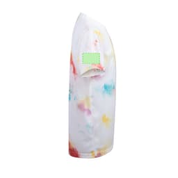 A tie-dye kids' T-shirt in vibrant colours, featuring a short sleeve and a logo on the sleeve.