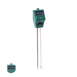 A green moisture meter with a dial display and two metal probes for testing soil moisture levels.