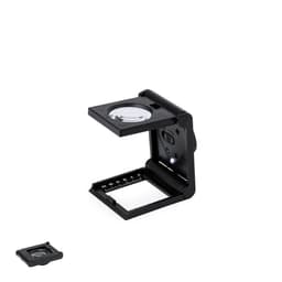 A black magnifying glass with an LED light and folding design, featuring a ruler on its base.