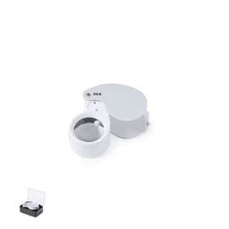 A white 30X magnifier enclosed in a black case. The magnifier has a cover and a viewing lens.