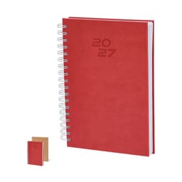 A red spiral-bound diary for 2027 with a smooth cover and a smaller, brown notebook beside it.