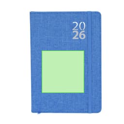 A blue diary with a fabric texture, featuring a blank green square and a silver year '2026' on the cover.