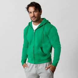A green zip-up hoodie with a kangaroo pocket and a hood, worn by a man, paired with grey sweatpants.