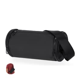 A black cylindrical bag with a shoulder strap and zippered compartments, featuring a logo.