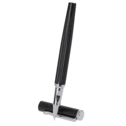 A pen with a sleek black barrel and chrome accents, displayed upright with its cap positioned nearby.
