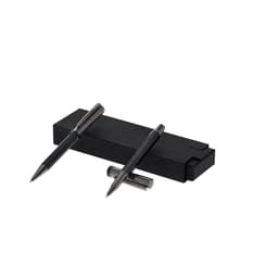 A black metal pen set displayed on a sleek black box, featuring two pens with shiny accents.