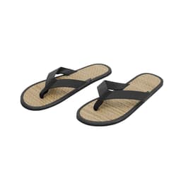 A pair of black thongs with a textured tan base, featuring a simple design and a logo on one strap.