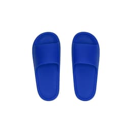 Blue thongs with a simple design, featuring a strap and a flat sole, presented from a top view.