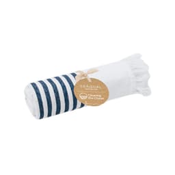 A rolled towel with navy and white stripes, featuring a natural tag indicating an ocean cleaning initiative.