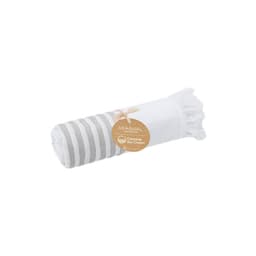 A rolled white towel with grey stripes, featuring a tag related to ocean cleaning initiatives.