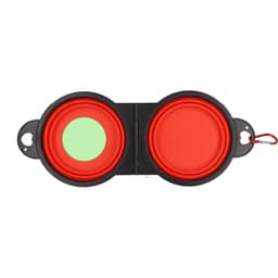 A foldable pet bowl in red and black, featuring two compartments with a clip for easy carrying.