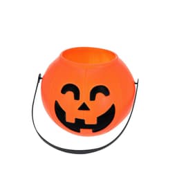 An orange pumpkin-shaped container with a smiling face and a black handle. It features a cut-out design.