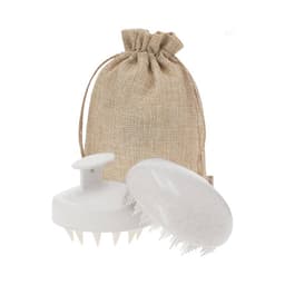 A natural jute pouch containing a white scalp massager and a hairbrush, showcasing a simple and eco-friendly design.