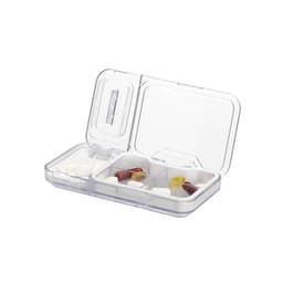 A clear medicine organiser with compartments, containing various tablets in white, red, and yellow colours.