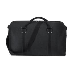 A black duffle bag with dual handles and a detachable shoulder strap, featuring a sleek design and a logo.
