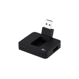 A black USB hub featuring multiple ports and a standard USB connector, with a logo on the surface.