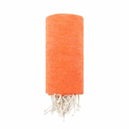 An orange towel with white tassels at one end, featuring a logo.