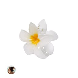 A white and yellow flower-shaped hair clip with a glossy finish and a securing mechanism at the back.