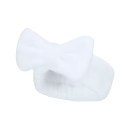 A white headband with a large bow, made from soft, fluffy material. It features a branding logo.