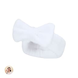 A white headband featuring a soft fabric and a bow detail, designed for headwear use.