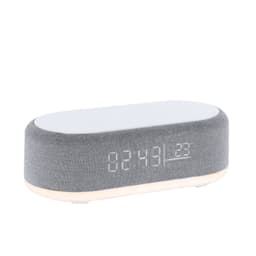 A wireless charger in grey fabric with a white top, featuring a digital clock display.