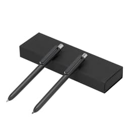 A black gift box containing two black pens with silver accents. The box features a simple design and has a logo.