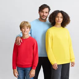 A red, blue, and yellow hoodie worn by a child and two adults, showcasing different sizes and colours.
