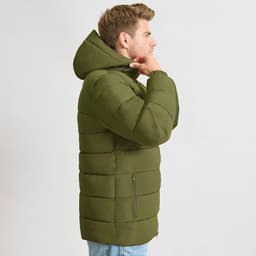A puffer jacket in olive green with a hood and side pockets, featuring a modern and stylish design.