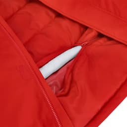 A red puffer jacket featuring a zippered pocket and soft lining inside. The jacket has a logo on it.