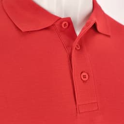 A red polo shirt featuring a collar and two-button placket, displayed on a mannequin. It has a logo.