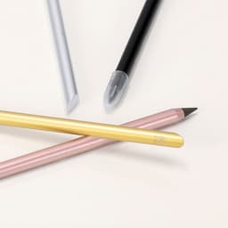 A set of grey-lead pencils in black, gold, silver, and pink, featuring different tip styles and a logo.