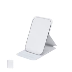 A compact white mirror with a stand, featuring a glossy finish and a slim design.