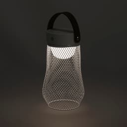 A metallic mesh lamp with a black handle, featuring a warm white light, set against a dark background.