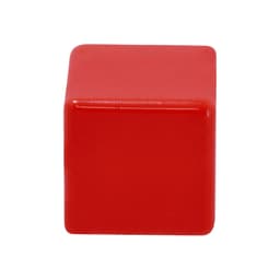 A red, glossy stress cube with a smooth surface, featuring a logo on one side.
