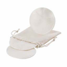 Two round, white reusable cotton facial pads with a drawstring bag for storage. 