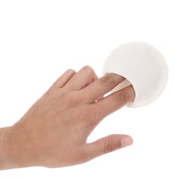 A white, circular finger sponge being held by a hand against a plain background, featuring a logo.