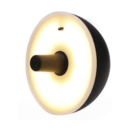 A round lamp featuring a white glow with a black and gold design, complete with a logo.