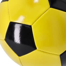 A yellow and black sports ball with a shiny surface featuring hexagonal panels and a logo.