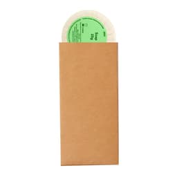 A brown envelope containing a circular item with a green label on the top, revealing part of its contents.