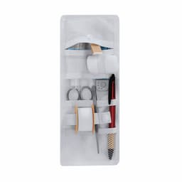 A white health kit featuring scissors, bandages, tape, a pen, and other medical supplies in a compact pouch with a logo.