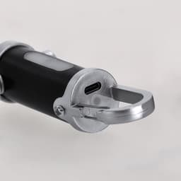 A black Luvaron Torch featuring a metal attachment and USB-C charging port. Includes a branding logo.