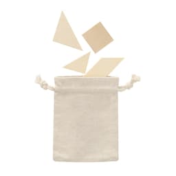 A cream-coloured drawstring bag with geometrically shaped wooden puzzle pieces spilling out.