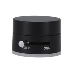A black and silver device with a rotating switch labelled "ON" and "OFF," featuring a smooth, rounded design.