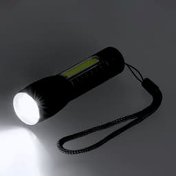 A black torch with a luminous bulb and a detachable wrist strap, featuring a branding logo.
