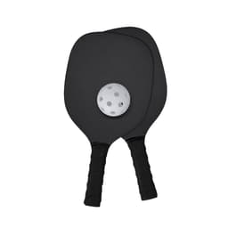 Two black beach rackets with black grips and a white ball with holes resting on them. The image features a logo.
