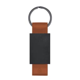 A brown and black keyring featuring a circular metal ring and a rectangular leather section, with a logo.